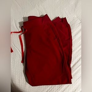 Figs. Winning red. Size small petite. Zamora jogger.